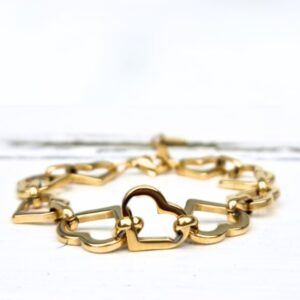 Trendy stainless steel schakelarmband met 9 hartjes. 18 cm + verlengketting, dus geschikt voor elke pols.